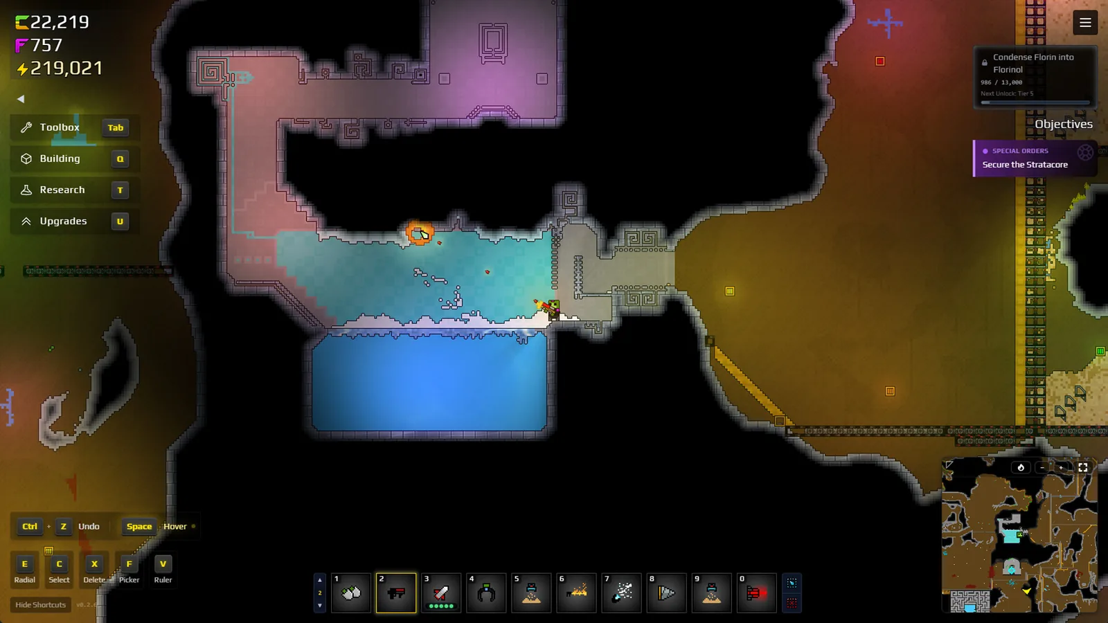 Official Steam screenshot showing a Sandustry underground map with a natural water pool and contained water basin